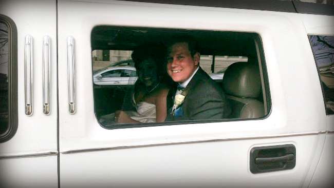 Bride & Groom in Limousine