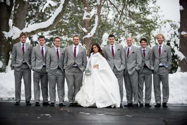 Bride in Floor-Length Fur Cape With Groomsmen