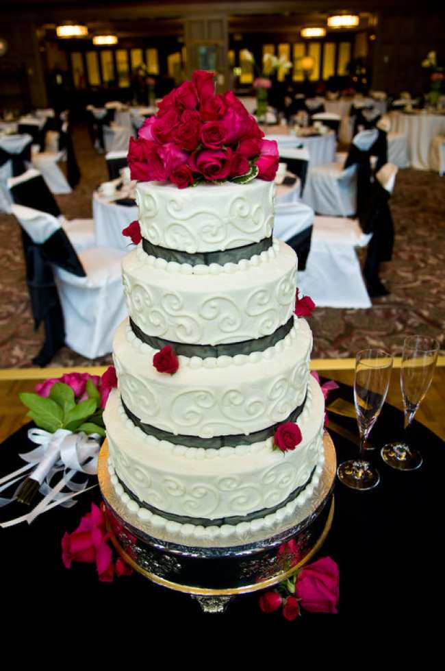 White cake with red flowers