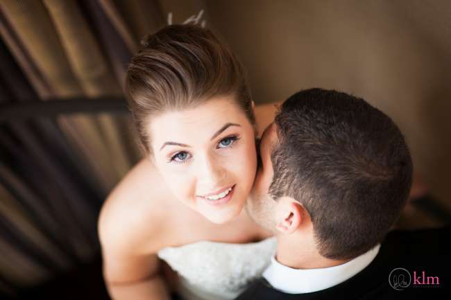 Groom Kissing Bride's Cheek
