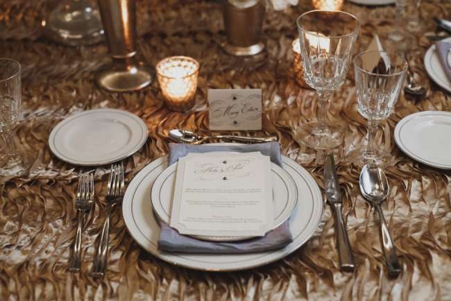 Simple Menu Atop Gold, Textured Linens