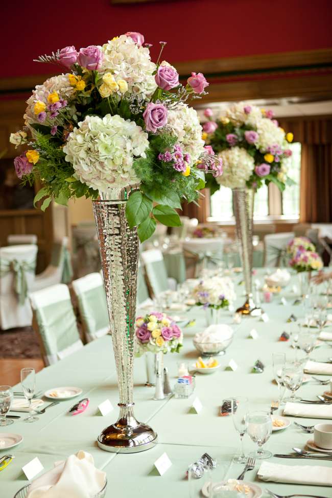 Tall, Floral Centerpieces in Silver Vases