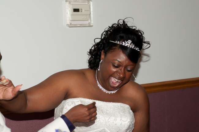 Groom Feeding Bride Cake