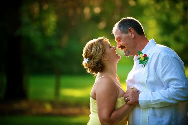Couple Embracing at Outdoor Wedding