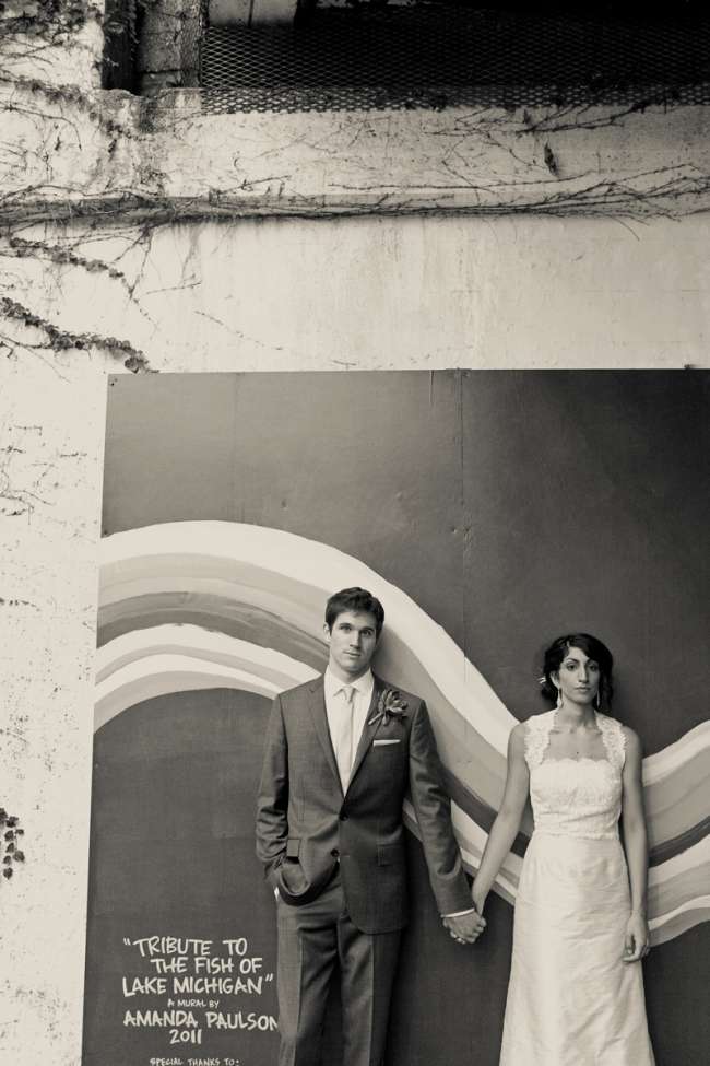 Bride & Groom Standing by Mural