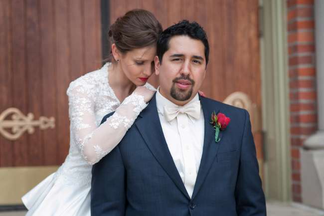 Bride Embracing Groom in Classic Bowtie