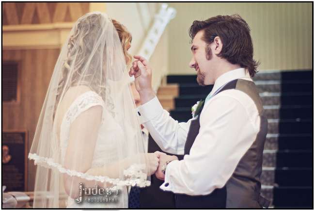 Groom Wiping Away Bride's Tears