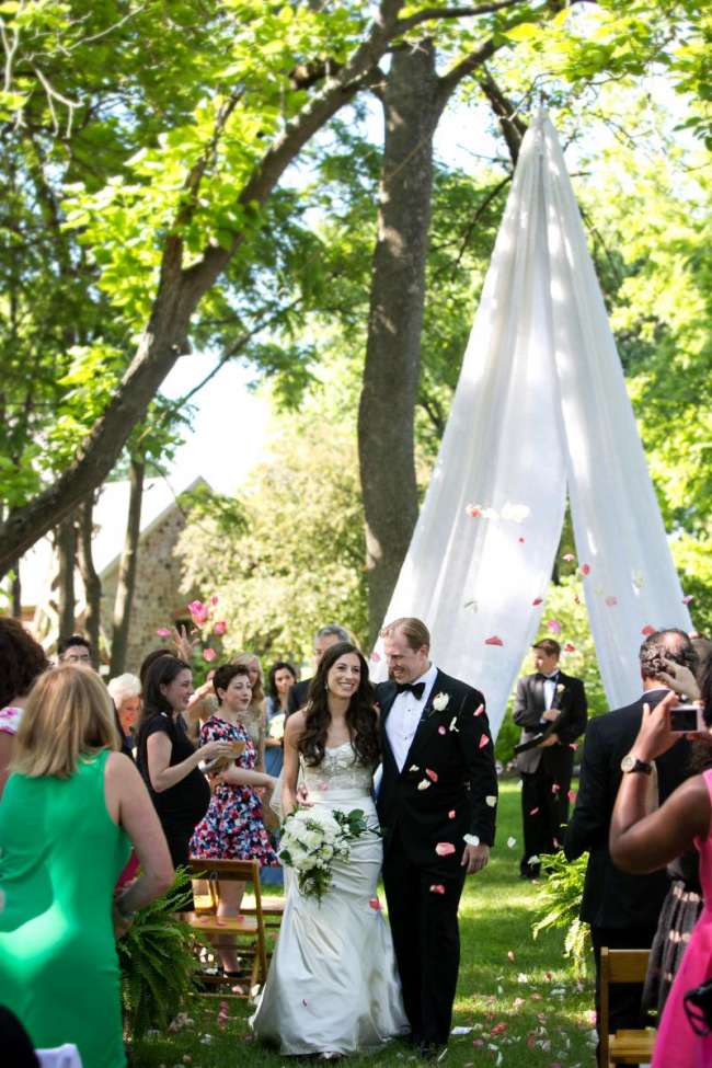 Flower Petals Thrown as Bride & Groom Walk Down the Aisle