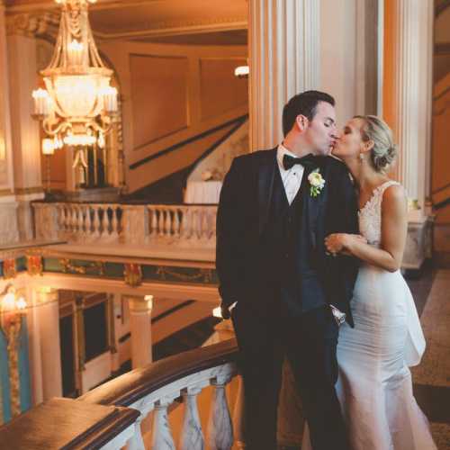 Wedding Couple Kissing in Morris Performing Arts Center Grand Lobby