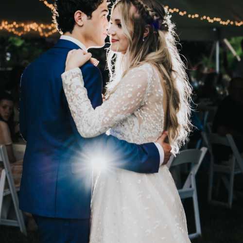 Beautiful wedding day first dance photo, professional lighting